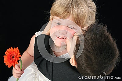 Bedwettingyear   on Stock Image  Adorable Toddler Boy Kissing Four Year Old Girl On Cheek